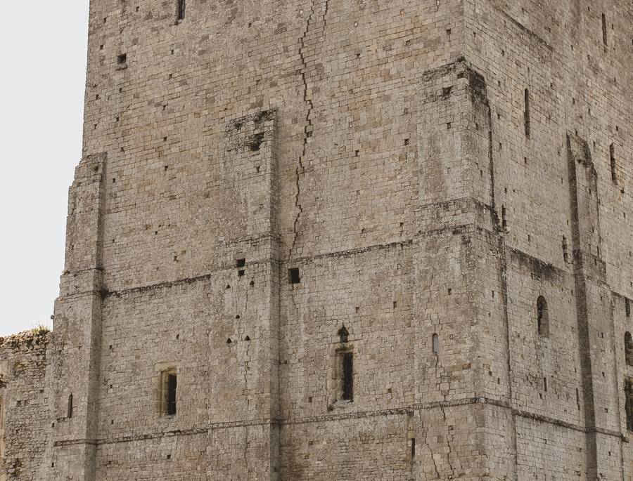 Close detail of coursed stonework and lime bedding